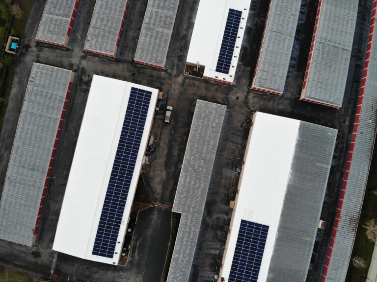 Aerial view of the 118 kW rooftop solar system PPM Solar built for Access Self Storage