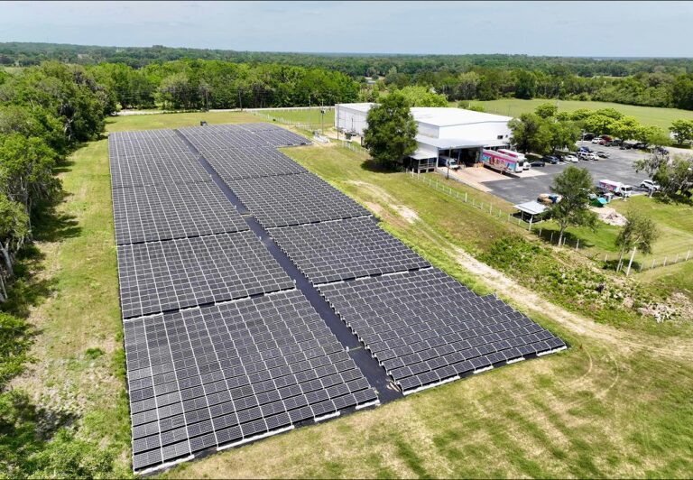 Aerial view of the 794 kW ground-mount solar array PPM Solar built for DeConna Ice Cream