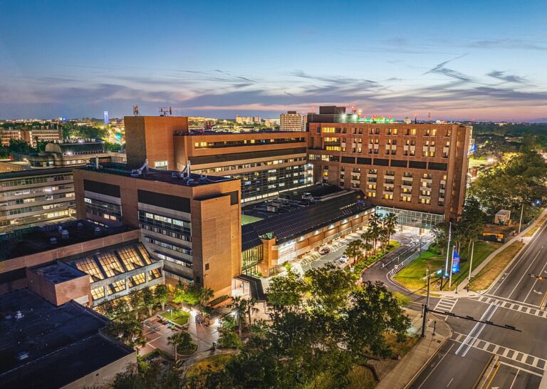 Aerial view of UF Health Shands Hospital with rooftop solar