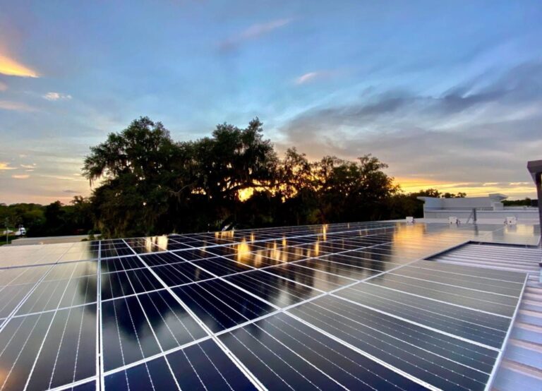 Rooftop solar panels at SmarterStorage at sunset