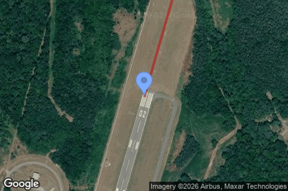 Satellite view of a runway with the two-mile approach path marked